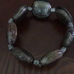 Brown Stone with Silver elasticized bracelet.